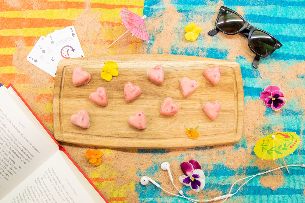 Beach Berry Frosties treats on a wooden board