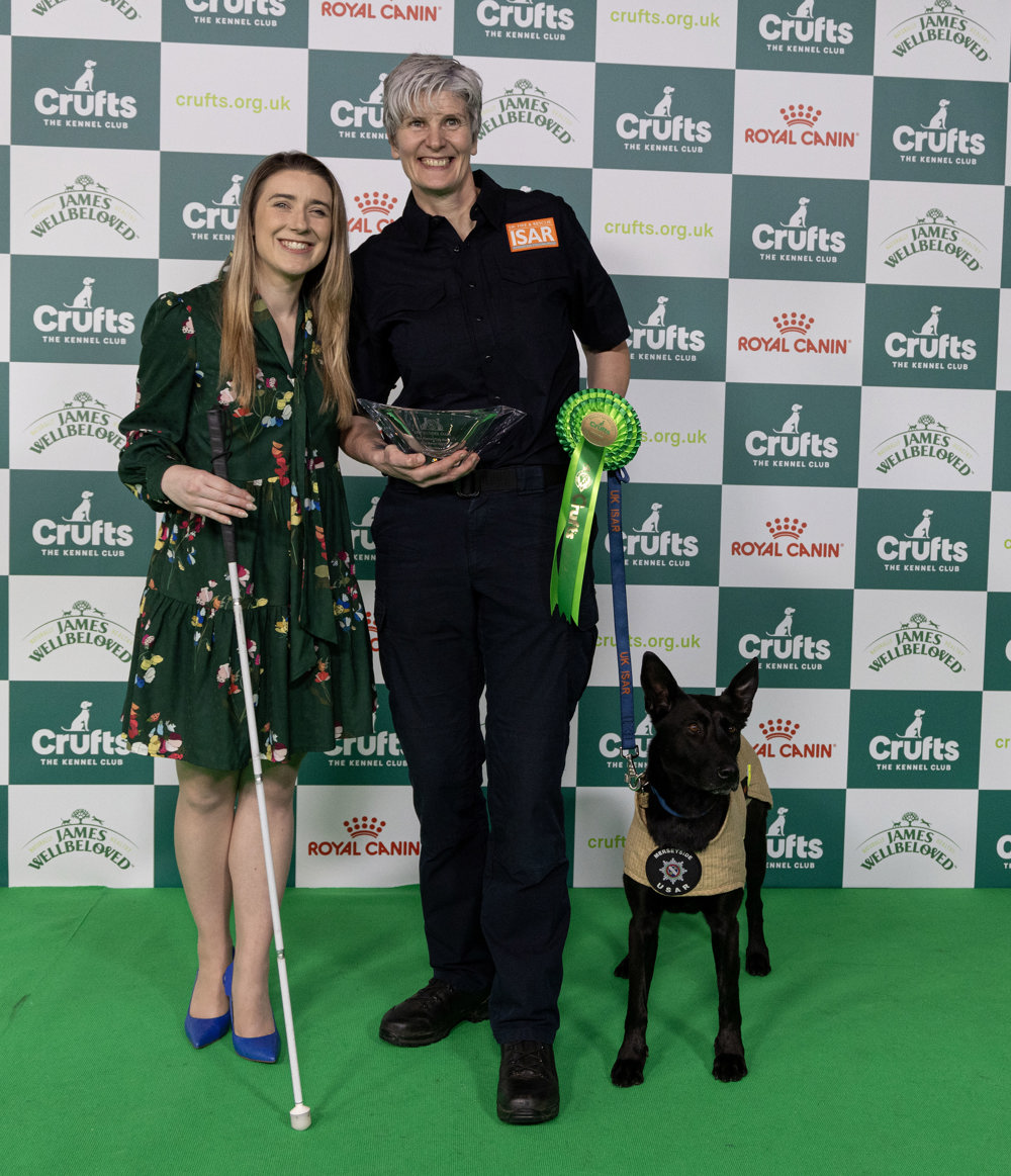 Crufts announces the nation's top canine hero: Vesper. Crufts Kennel Club Hero Dog Award winner, Niamh, Darcy and Libby Clegg Credit BeatMedia - The Kennel Club (1)
